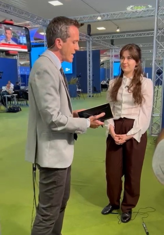 Jessica Rapson with BBC journalist Mark Lowen before a live interview at the 2024 G7 Summit