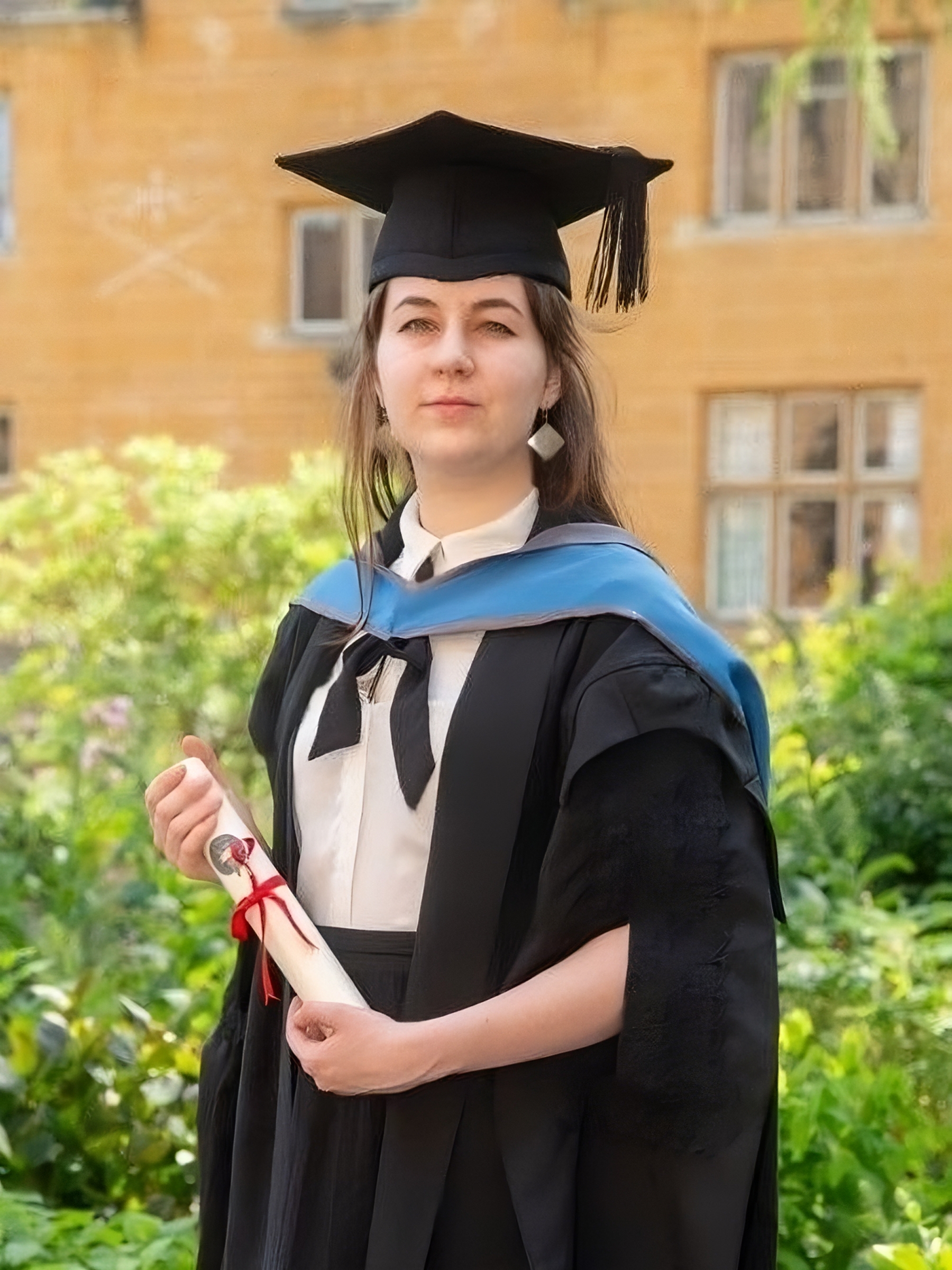 Jessica Rapson in academic dress at her University of Oxford graduation