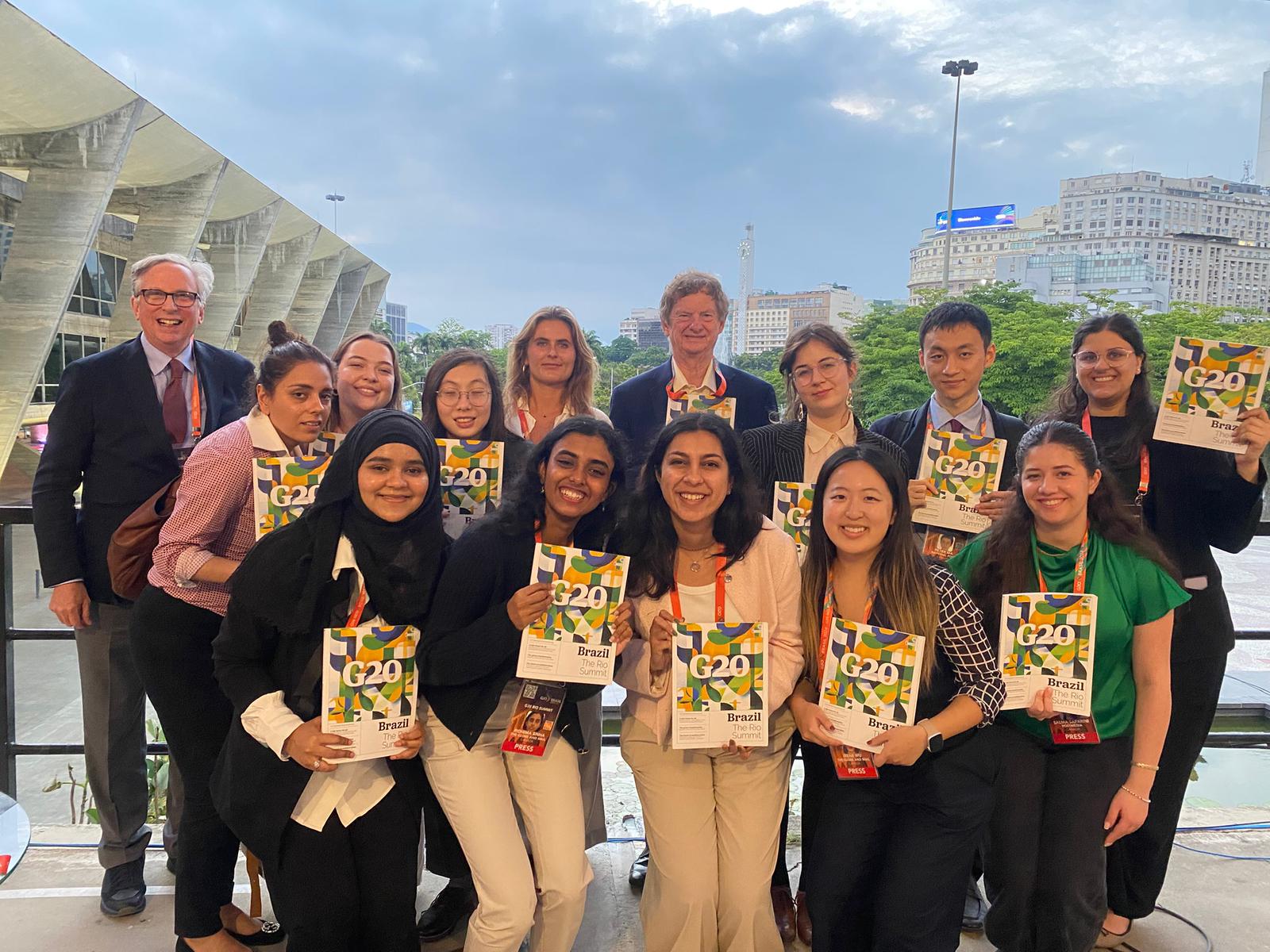 Jessica Rapson with the G7 and G20 Research Group team at the 2024 G20 Rio media centre