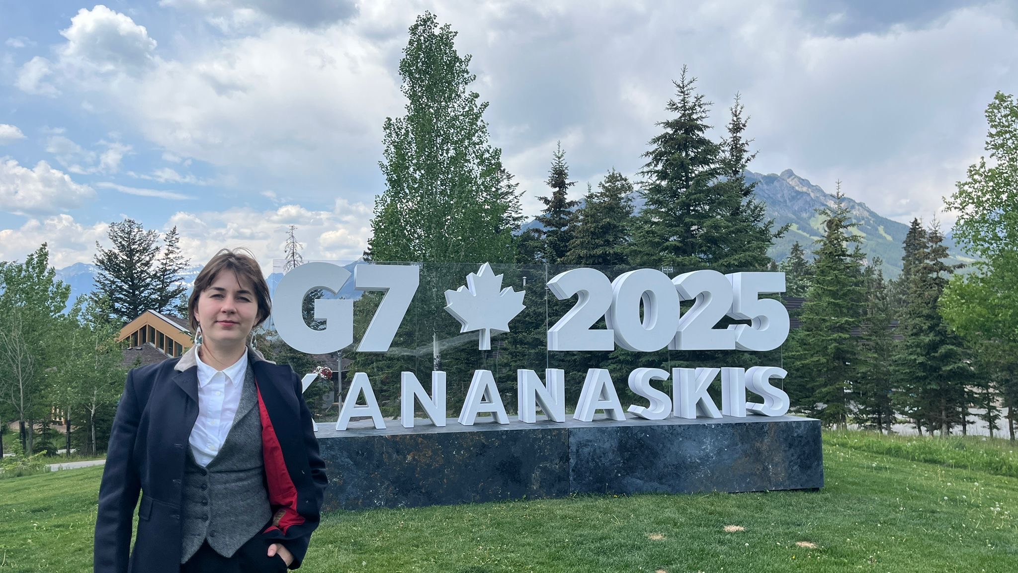 Jessica Rapson giving media interviews about her policy research at the 2025 G7 Summit in Kananaskis